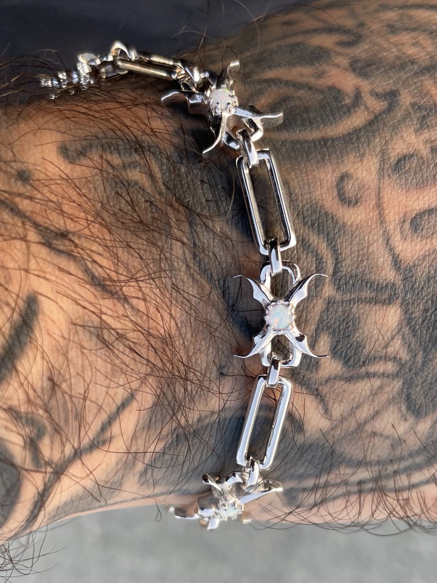 .925 silver bracelet
+ opal stones 

(sample)