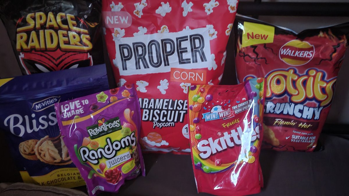 RyanActually1's tweet photo. Needed some snacks for my gaming this week ...well maybe day or two (I know these won't last that long). #Gaming #Snacks #ProperCorn #McVitiesBlissfull #Skittles #RowntreesRandoms #SpaceRaiders #WotsitsCrunchy https://t.co/Jl99sybgOf
