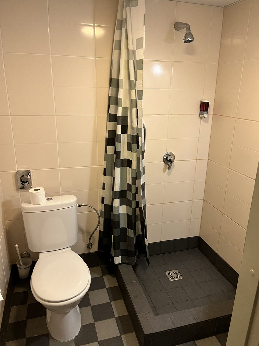 Domus Hotel, Riga, Latvia.
Plug by bed (by one of the smallest most uncomfortable single beds ever), free wifi, ok shower (in the worst bathroom ever), no biscuits