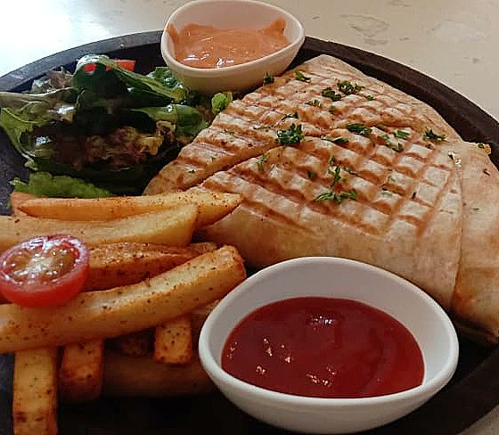 Mexican Wrap with Salsa, Chipotle Mayo Sauce and French fries at 'poetry by love and cheese cake ' bandra west <a href="/PuneFoodSpot/">Sameer</a> <a href="/dessertnsnacks/">Dessert n Snacks</a> <a href="/PuneFoodAlerts/">Food Alerts</a> <a href="/MumbaiFoodFoodi/">Mumbai Food Foodie</a> #bandrafood #mumbaifood #mexicanwrap #foodblogger