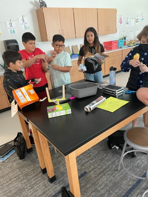 WestLibertyCSD's tweet photo. Our 5th grade Comets enjoyed some engineering fun today! Students were given a set of materials and asked to create either a basketball hoop or a football goal post and design and build something that would shoot or kick the ball. #creativemindsatwork https://t.co/9T3qz6RkHx