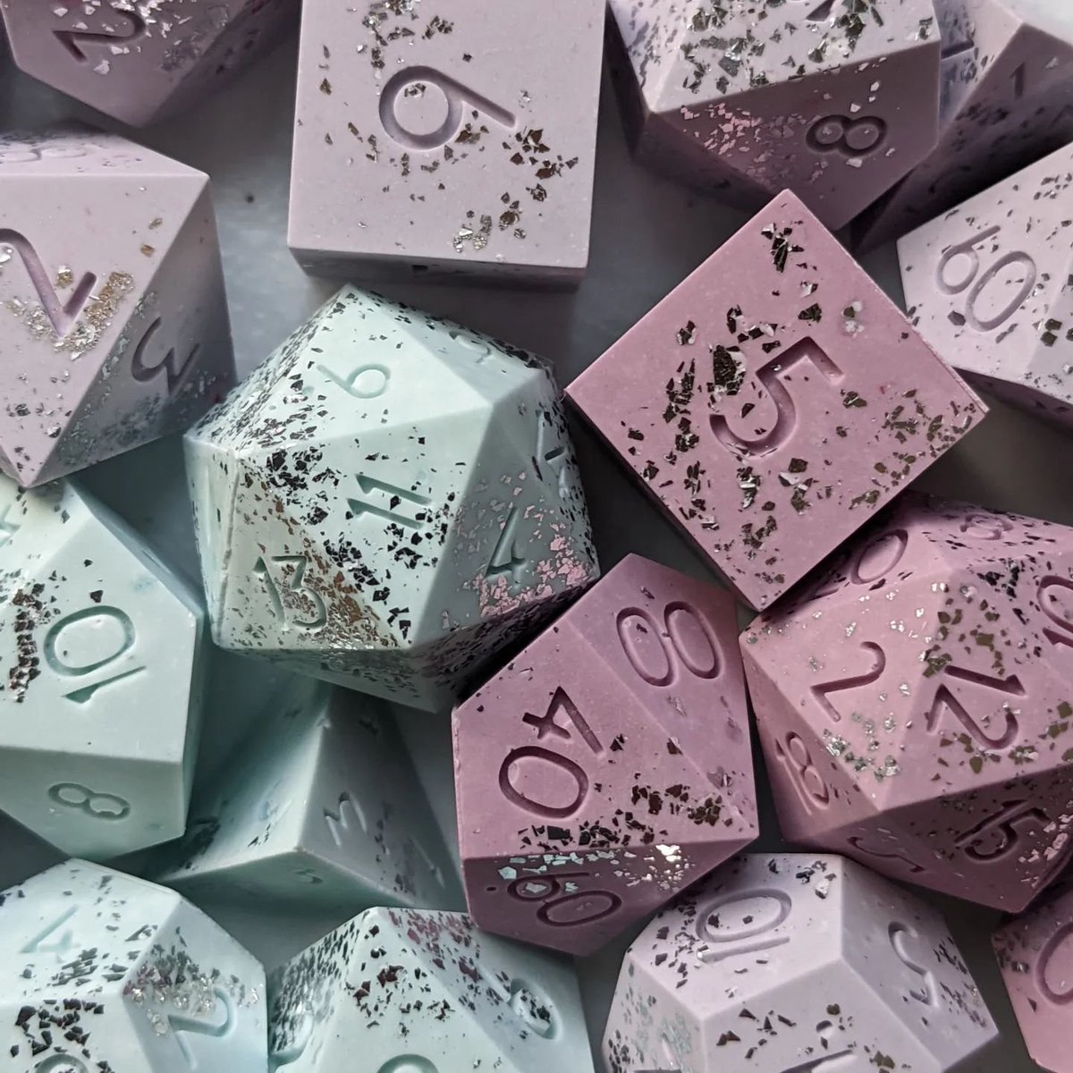 detectmagicdice's tweet photo. If these dice were chocolate, what flavor would they be? Disclaimer, you'll probably chip a tooth attempting to cromch these faux-stone dice!
#sharpedgedice #handmadedice #diceporn #pasteldice https://t.co/CjYF1QNYzy