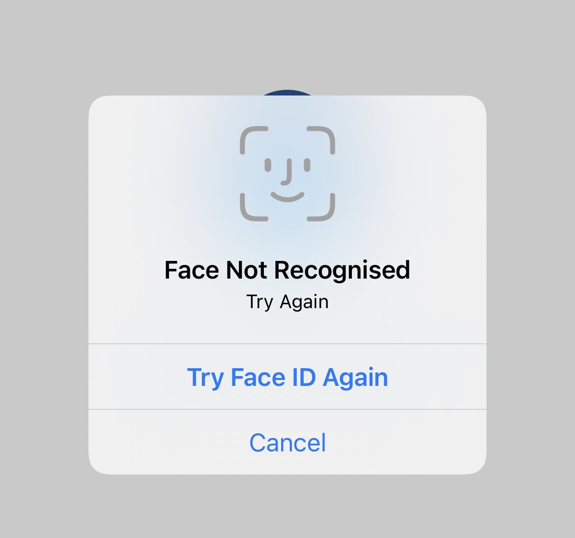 iPhone face unlock dialogue, stating “face not recognised, try again”