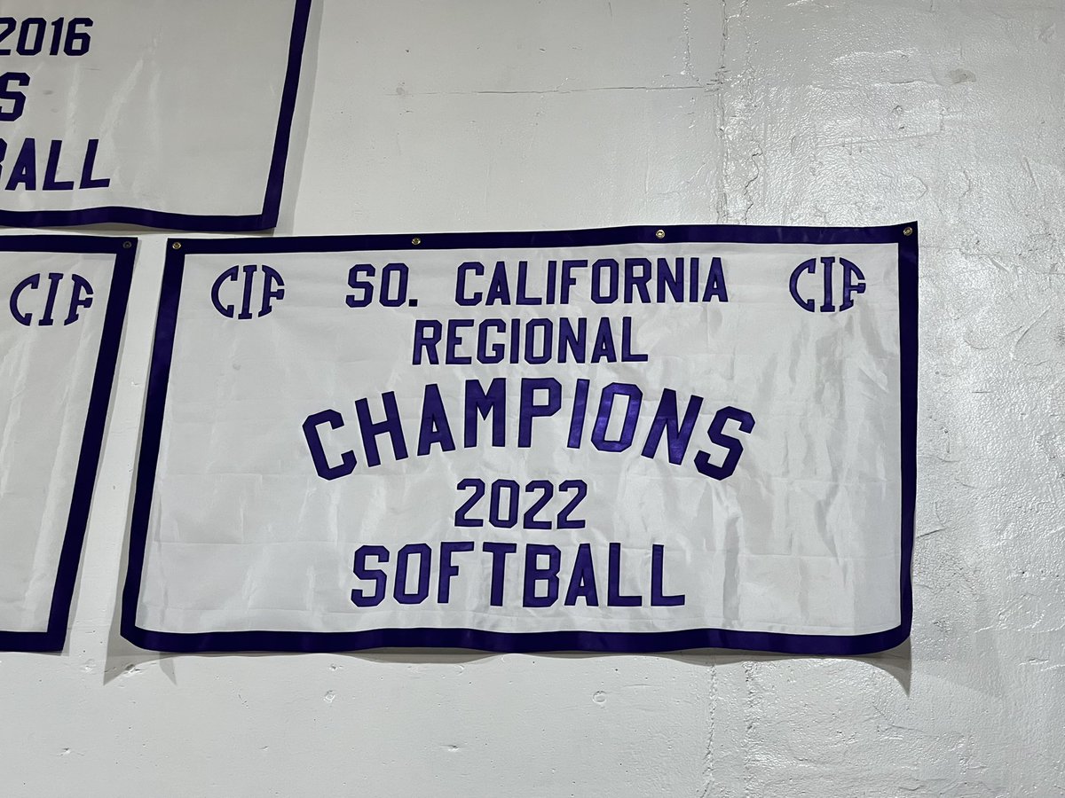Now hanging inside of Jack Errion Memorial Gymnasium is CIF banner number 15, courtesy of the 2022 Lady Saints softball team. 👼🏻🥎🏆 #FearTheHalo