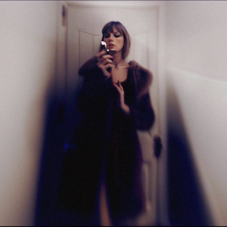 ColaEditz's tweet photo. why is there a door? why has she got a lighter? is she burning the house down? then why is she inside? the coat, loving it. the cover living it https://t.co/Ijpx9R5QYf