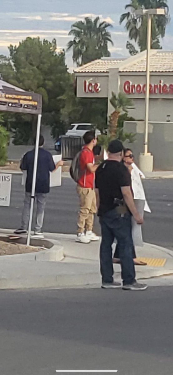So disturbing: Here’s a NV GOP employee BRINGING A GUN to protest an East Las Vegas office opening for <a href="/StevenHorsford/">Steven Horsford</a>. Reps. Tony Cardenas and Nikema Williams attended the opening too. Are GOP state parties suggesting staffers show up armed to a political opponent’s events now?