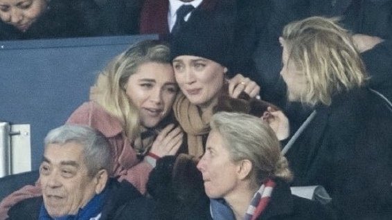 pughposts's tweet photo. florence pugh, timothée chalamet and saoirse ronan at a football match, WHAT A MOMENT https://t.co/IIFwbqPFep