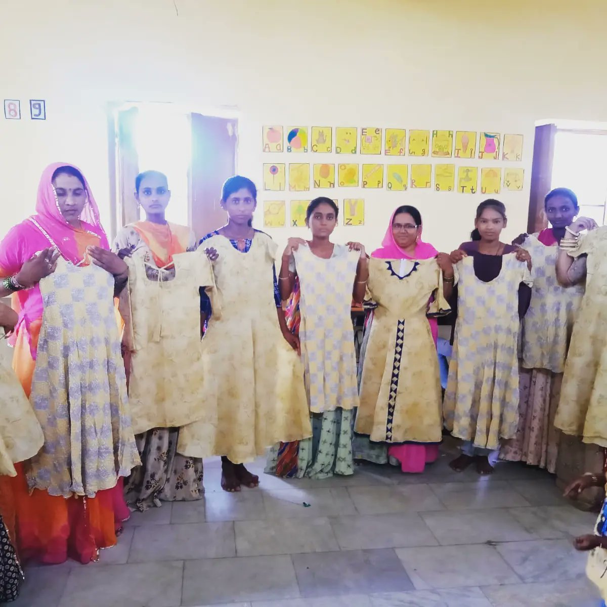 SambhaliTrust's tweet photo. People ask us what do we do with the clothes that women learn to make? 
You will be happy to know that these clothes are given to them as a souvenir, something they cherish, they own which is self-made. 
#sambhalitrust #vocationaleducation #vocationaltraining #skilldevelopment https://t.co/4eJVuSzzyW