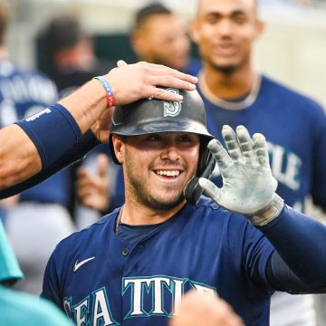 Ty France is all smiles after hitting a home run. 