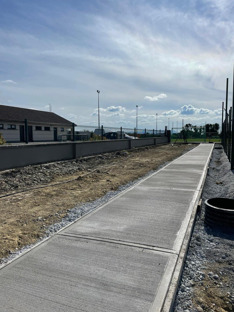 PST_Sport's tweet photo. Concrete footpaths prepared & poured here at @LixnawGAA. PST is a Design & Build specialist contractor focusing on the construction of all artificial grass sports surfaces & supporting infrastructure (fencing, lighting, access etc.) offering a #completeturnkeysolution to clients. https://t.co/eT0AtIJgAP