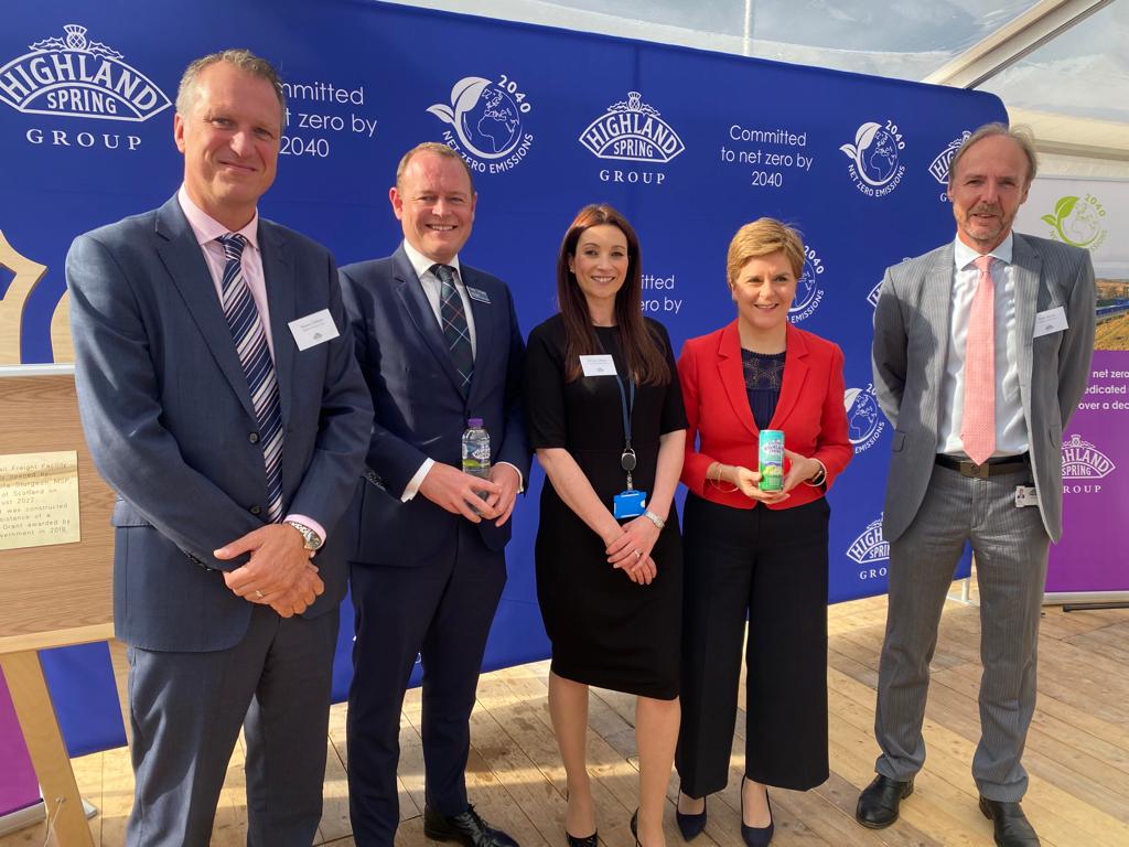 ScotGovFM's tweet photo. In Blackford today, First Minister @NicolaSturgeon officially opened the @Highland_Spring Freight Facility.

The line, part funded by a @scotgov Freight Facilities Grant will help the company transport goods while removing 8 thousand HGV movements from the road every year. https://t.co/ECM2anUzIB
