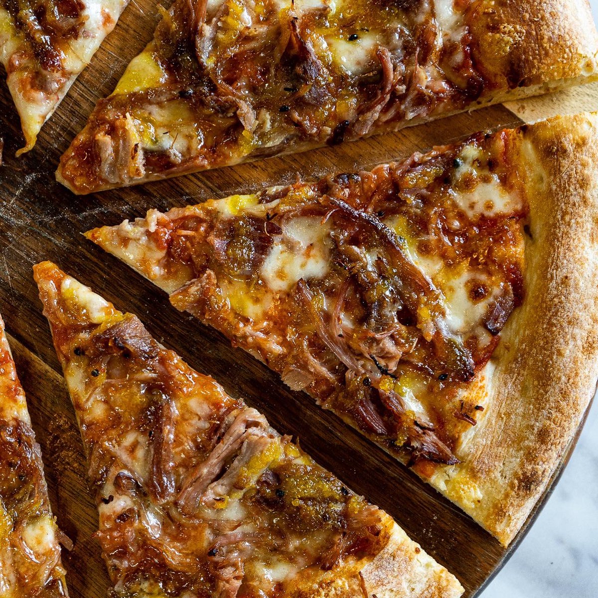 Love it or hate it? 🍍🍕
 
Slow smoked premium British pulled ham, with awarding-winning pineapple &amp; Dorset Naga chilli chutney, complemented with rich, buttery Devonshire cheddar and British fior di latte 😋

#hamandpineapple #cheddar #pizza #realpizza #british #farmtoslice