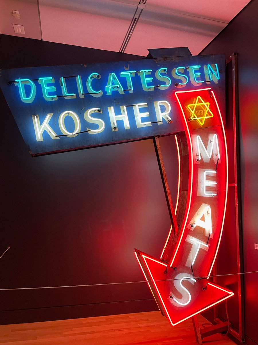 LAhistory's tweet photo. Recently visited the @Skirball_LA’s lovely exhibit “I’ll Have What She’s Having”, about the history of the Jewish delicatessen. Exhibit closes September 18: https://t.co/1EMKGLj86r 
- Neon sign from Drexler’s Deli 
- Uniform &amp; menu from @CantersDeli 
#JewishDeli #foodhistory https://t.co/IPWeNJgmZI