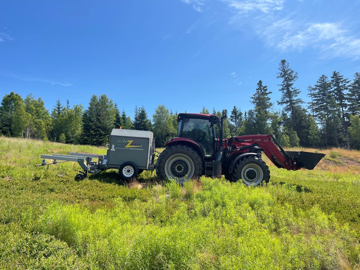dalagriculture's tweet photo. Drs. Scott White and Travis Esau are currently evaluating an electronic weedzapper for suitability for use in wild blueberry cropping systems. This is the first unit in Atlantic Canada.  #innovation  #smartfarming https://t.co/i7rdka2p1m