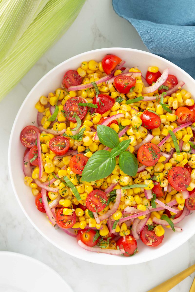 This bright and refreshing Corn and Tomato Salad 🌽🍅is full of fresh corn, juicy tomatoes, red onion and fresh herbs in a simple seasoned vinaigrette. It’s a guaranteed crowd-pleasing side dish!  bit.ly/3TtrxK8
