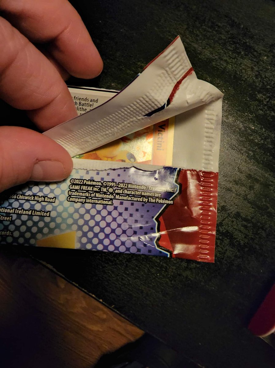 JoeEngelhardt's tweet photo. @McDonaldsCanada so staff at one of your stores are searching the pokemon card packs? This is how the pack in our delivery order arrived. Not cool. Can we please get this sorted. https://t.co/d6qjk3jwOX