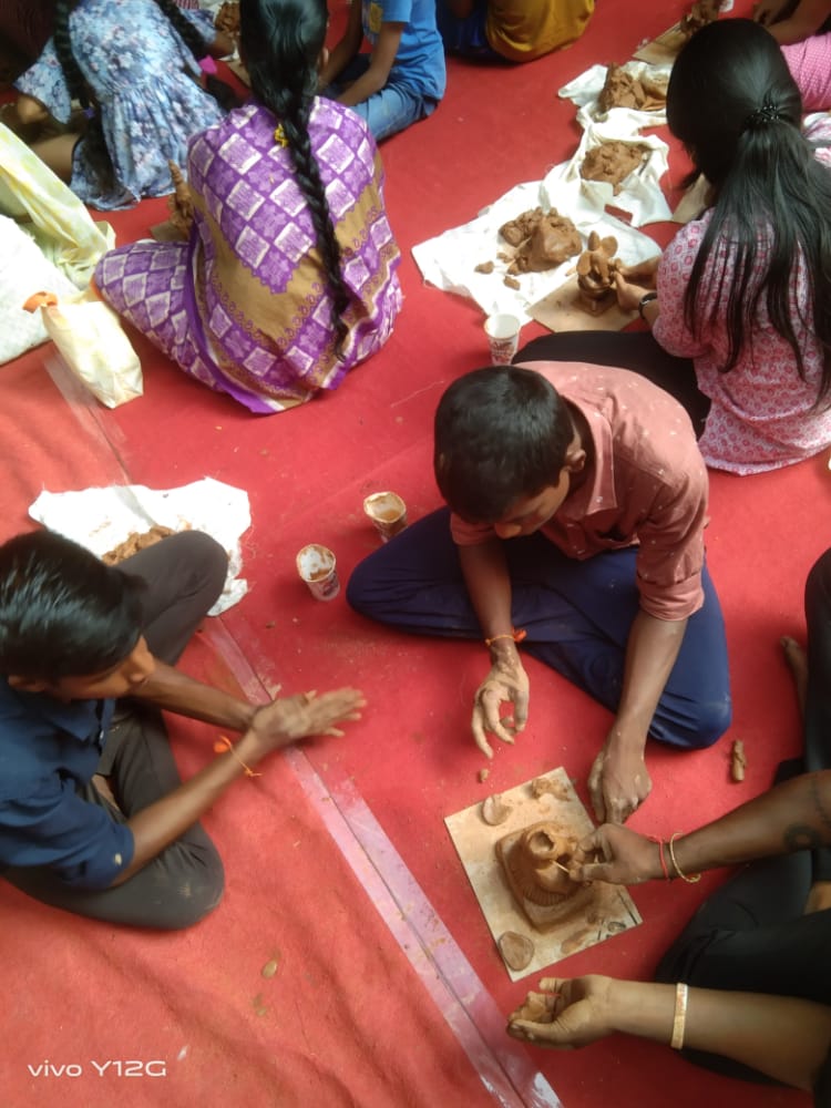 nelefoundation's tweet photo. All our Gowris and Ganeshas yes , our own Nele children soaked in total bliss  when making Ganesha idols on their own.  #GaneshChaturthi https://t.co/ZFzMhG02lc