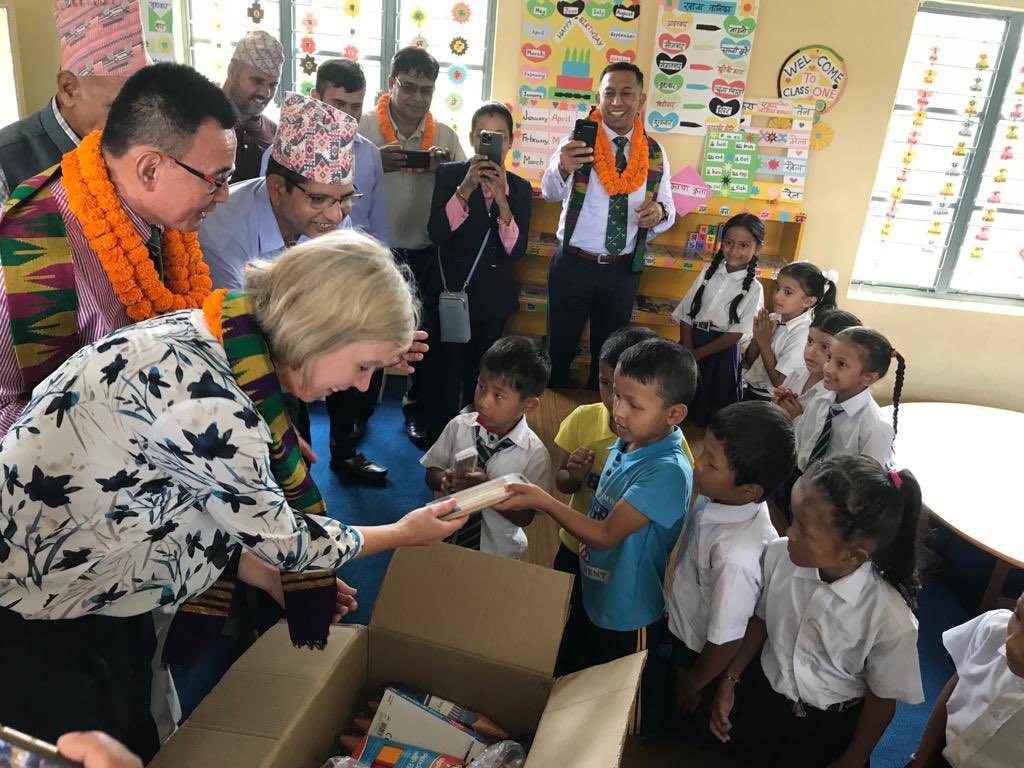 NicolaPollittUK's tweet photo. This school in Jhapa has new classrooms and a new library thanks to Gurkha Welfare Trust @gwtorg and 🇬🇧 NGO Cairn. I was given a fantastic welcome by students, teachers and community leaders when I inaugurated it today. @UKinNepal believes in 12 years of quality education for all https://t.co/WQUelto4EM