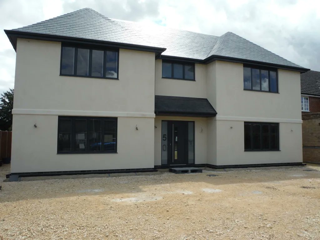 marleyalutec's tweet photo. A stunning new build using our #aluminium Evoke fascia type C with unvented soffit, Evolve Deepflow #gutter with 76mm Flushfit #downpipe, all in RAL7016 colour. Great looking project near a completion in collaboration with @Jewson #Stamford and Stone Houses Ltd. https://t.co/r7i5XMbfe8