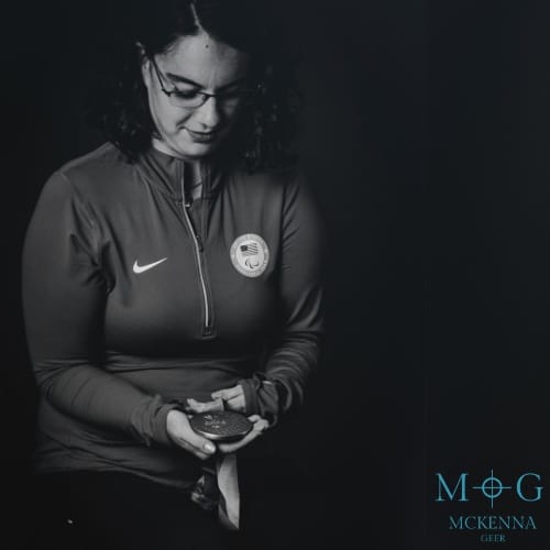 In rifle shooting, some targets are the size of a silver dollar, and the bullseye is equivalent to a half-millimeter dot – a period in a newspaper. 

Keep moving forward. Be your own hero in your journey. -MG

Photographer: Danielle Trina Photography 
Studio: Cultivate Studios