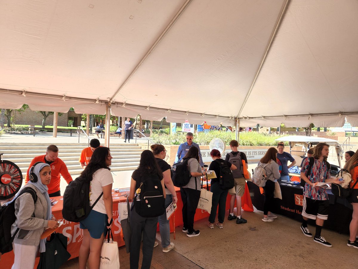 DrDrewAtSHSU's tweet photo. Bearkat Mania is in full swing!!! Come out and learn about all of the amazing resources that our community partners in Huntsville have to offer. And don't forget to stop by the big tent to find out about all the ways @shsustuaffairs can support you during your time at SHSU! https://t.co/eOPK5JOxnm