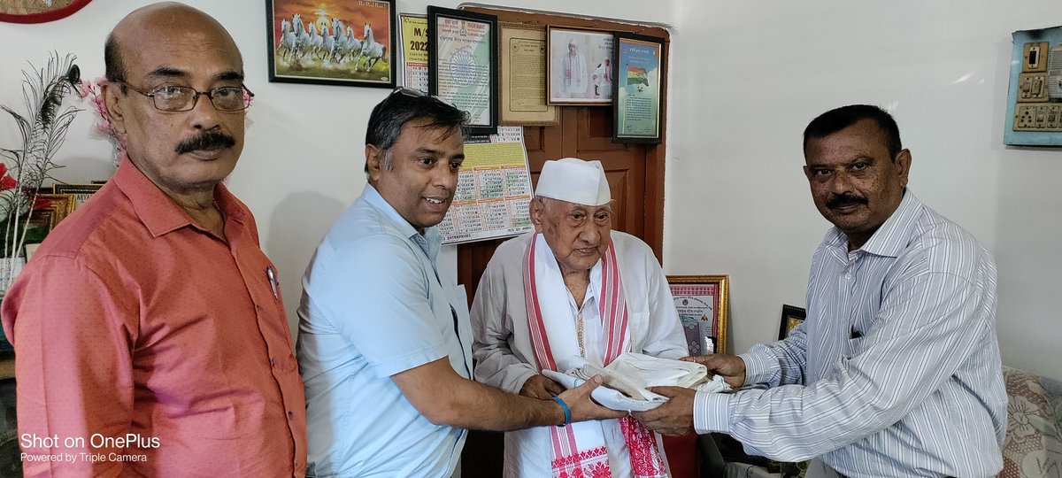 IncomeTaxNER's tweet photo. The Income Tax Department as a part of celebration of Azadi ka Amrit Mahotsav felicitated the centenarian freedom fighter Shri Khogeswar Gogoi and outstanding social worker Padmashree, Smt Lakhimi Baruah,  founder of the Konoklata Mahila Urban Co-operative Bank Limited https://t.co/IwBoqHVxJT