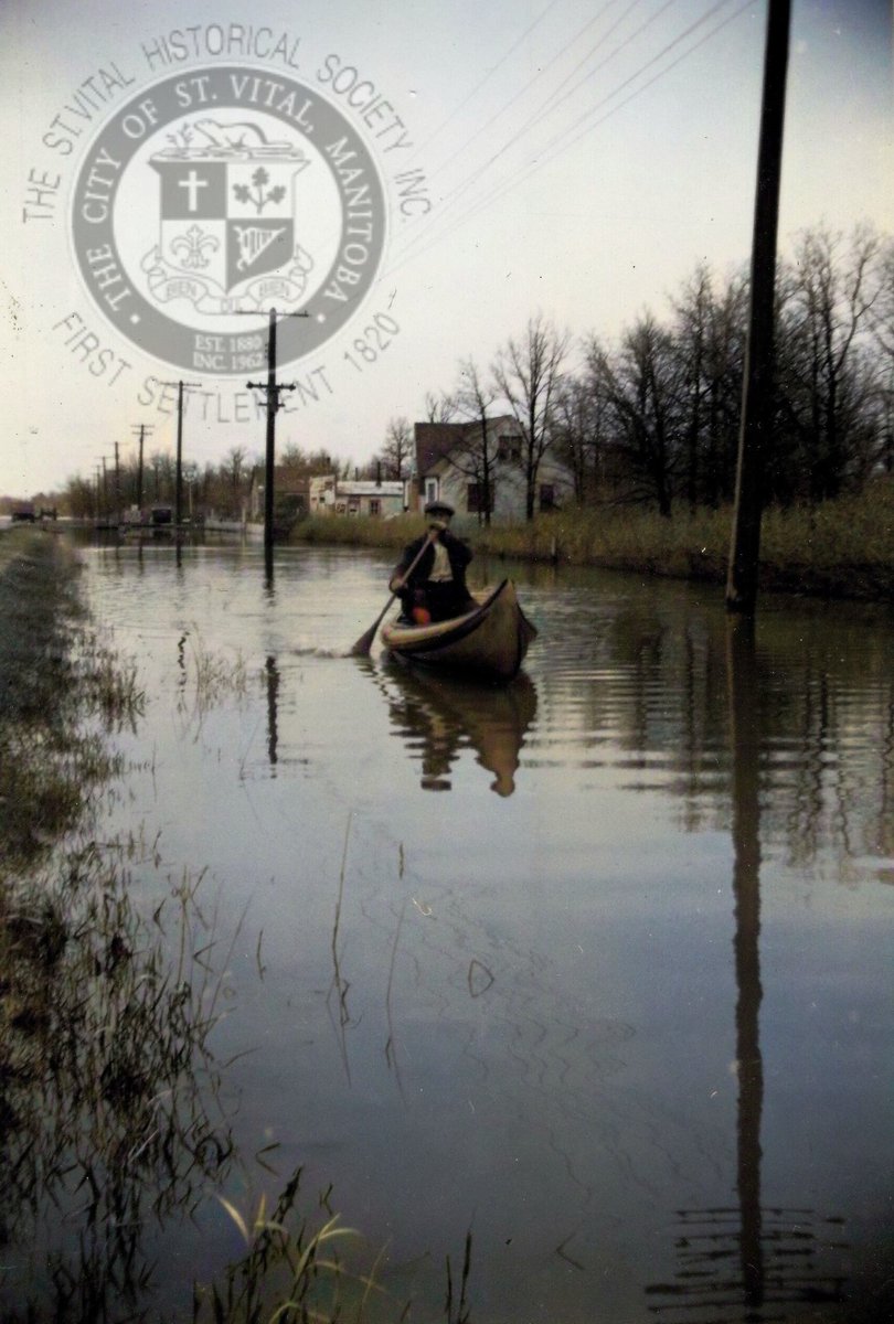 A man (likely Louis Mager of 701 St. Anne's Rd) canoes down St. Anne's Rd, St. Vital, during the 1950 Flood. It looks like he's between 701 St. Anne's &amp; 715 St. Anne's where Jules Mager's lovely brick house used to be. #stvitalmuseum #stvital #museum #archives #winnipeg #manitoba