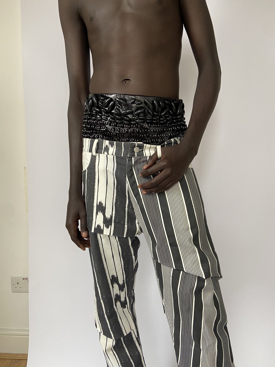 j_ewusie's tweet photo. Leather beaded cummerbund and folded, printed jeans Model: Gai ManYok https://t.co/akVYa7pEE6