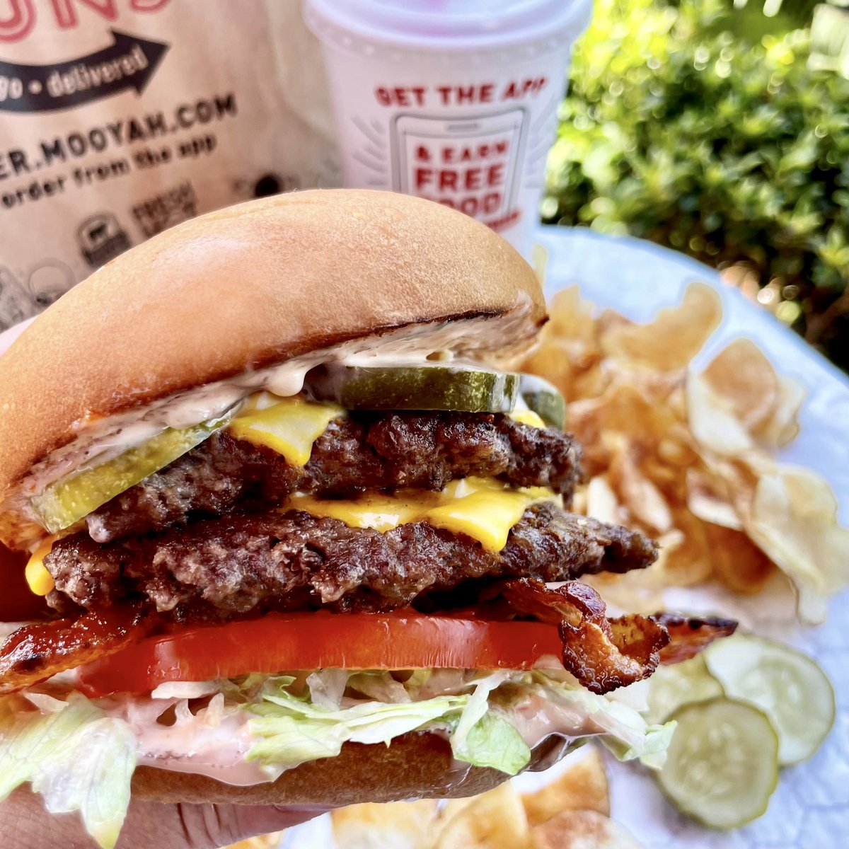 MooyahOC's tweet photo. #AskingForAFriend… Does eating #burgers outside count as being #outdoorsy? ☀️🍔😎 #MOOYAH #Ridiculicious #bestburger #rewardsapp #freefood #eatingoutside #eatoutside #nationaleatoutsideday #eatoutsideday #eatingoutdoors #letseatoutside #doublecheeseburger https://t.co/pYPnt5zUFc https://t.co/w1TVJ0pxuG