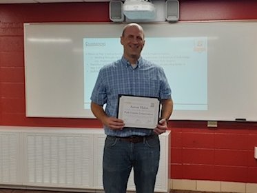 Proud to present Mr. Aaron Hahn, CHS Science Teacher, with a certificate recognizing him for participating in the Iowa STEM Teacher Externships this past summer. #GoCats