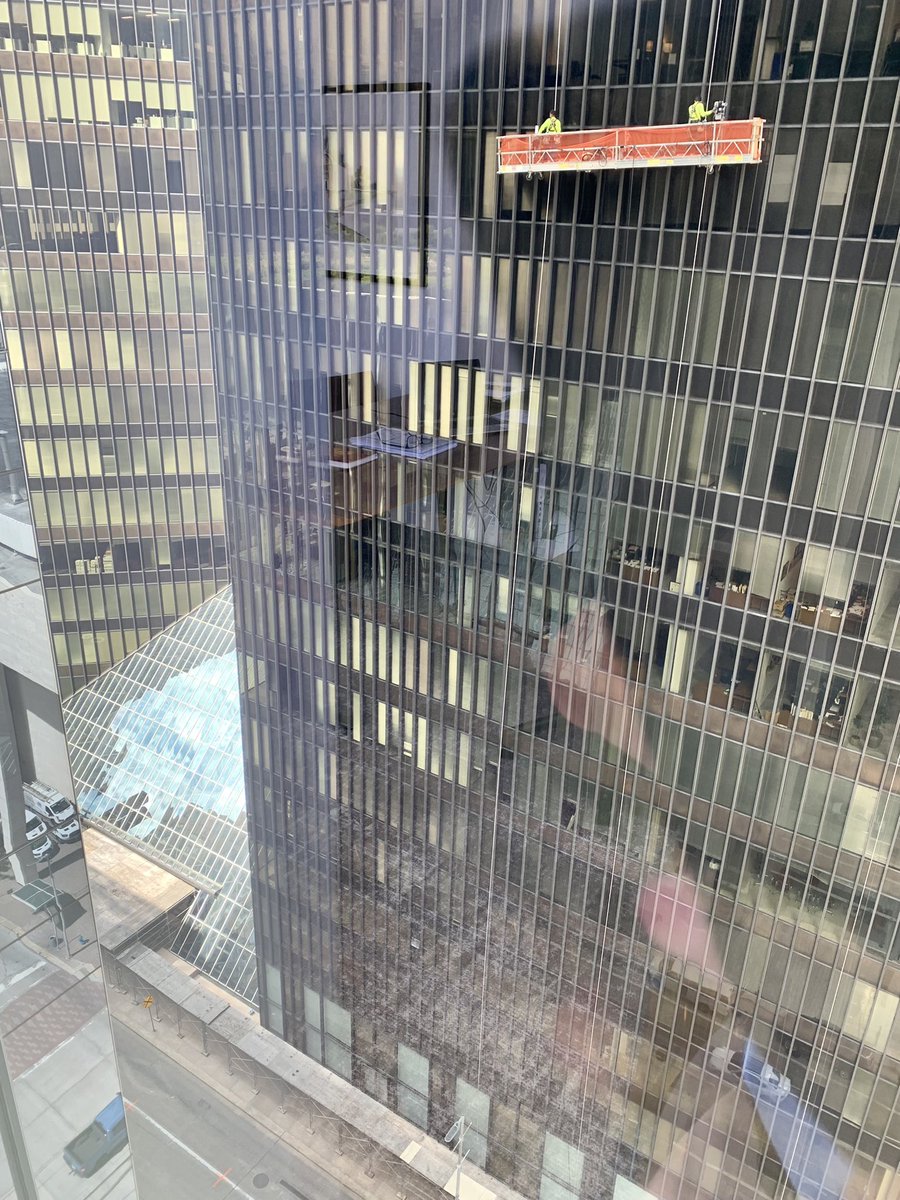 Watching skyscraper window washers from my office window always makes me grateful for my job! #HoustonSkyline Be Safe!