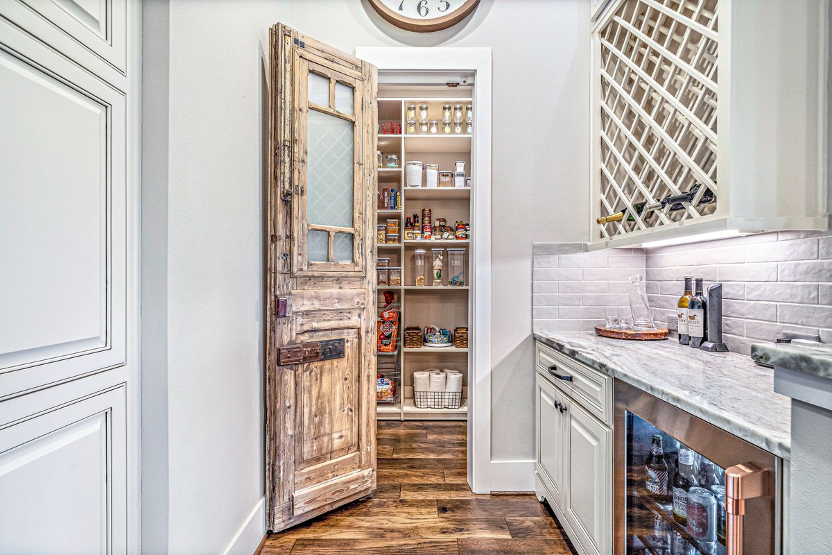 Perhaps the greatest part of our custom pantry (right up there with adding multiple accessories) is the ability to adjust the shelving to fit every food item and container.  Every day you'll walk into your new pantry, stress free and organized. SpaceManager.com