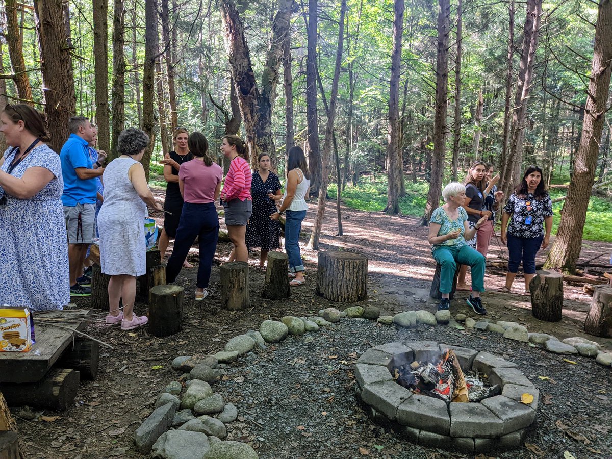 lauren_amrhein's tweet photo. To conclude Day 1, we had a staff gathering outside. We talked about successes from the day and ways colleagues lifted us up. We toured our outdoor classroom spaces and ended by sharing gratitudes and s'mores by a campfire. Felt great to be back together. #oneray #community https://t.co/0dZ28MsGcc