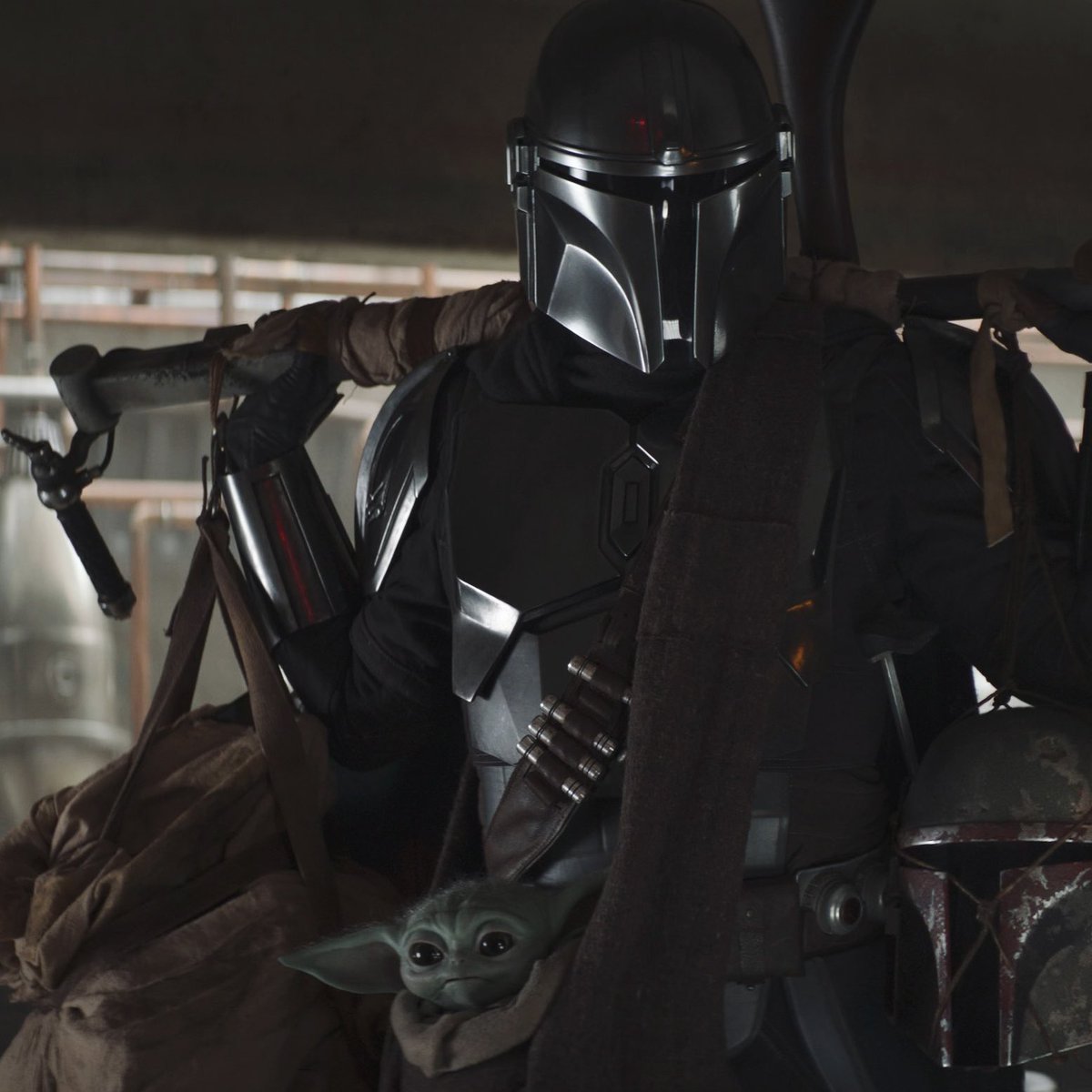 i love it when star wars is din djarin carrying grogu around in a satchel
