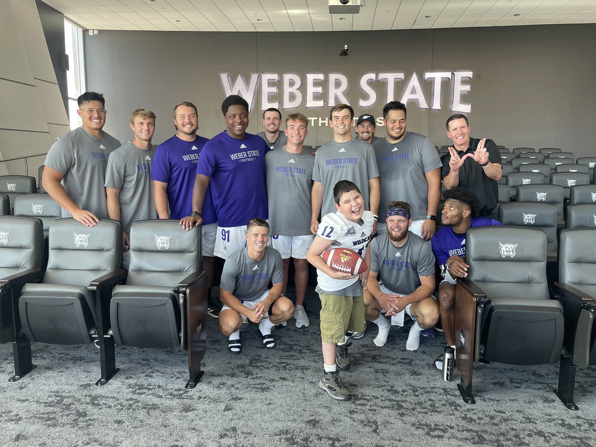 weberstate's tweet photo. New Wildcat! The @weberstatefb team signed 9-year old Kayden as part of @GoTeamIMPACT! 

#WeAreWeber https://t.co/iWnBbWkDPV