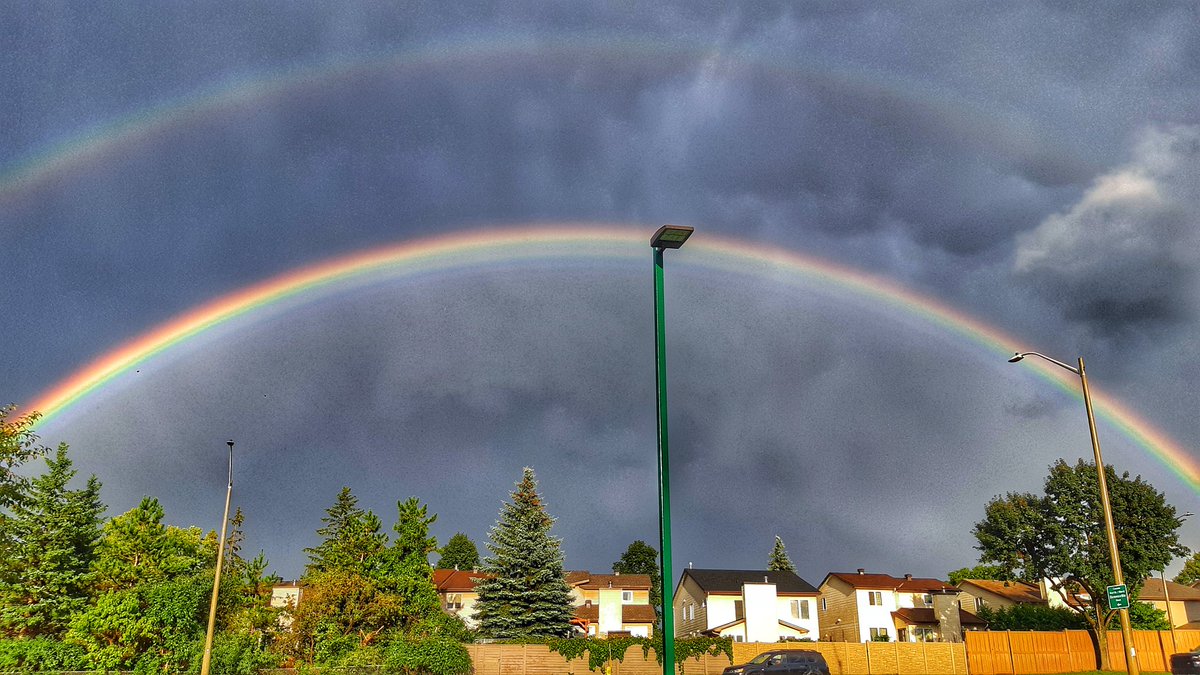 bmccabe's tweet photo. Double rainbow and nasty looking clouds https://t.co/JMbk13LAb4