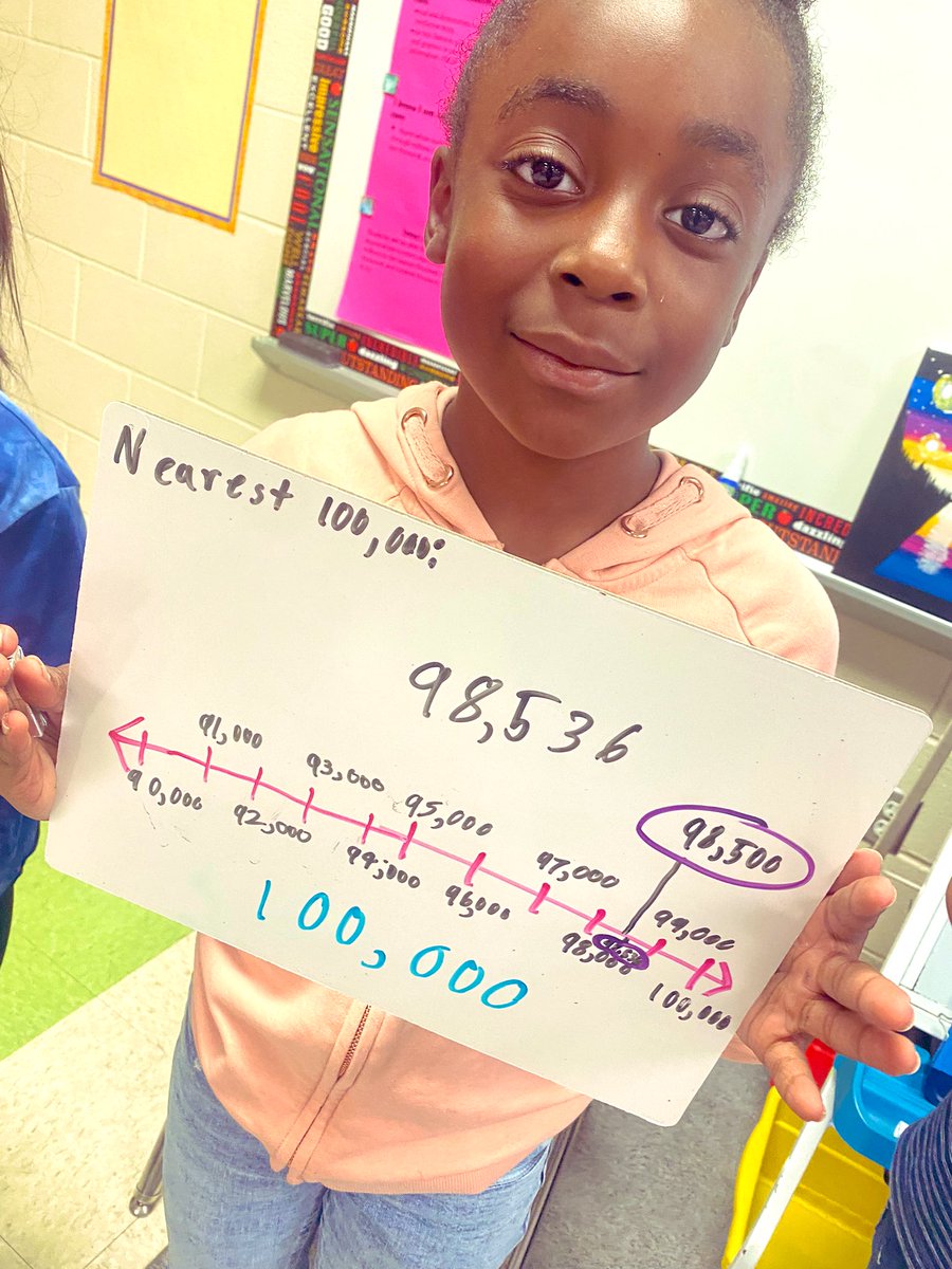 Shamruss876's tweet photo. Good Job Jessiah @FFES_PWCS  have a look at this little bright spark, right here showing her result of rounding 98,536 to the nearest 100,000 using her number line.  #letyourlightsoshine #goodjob #rounding https://t.co/via0GzXiHW