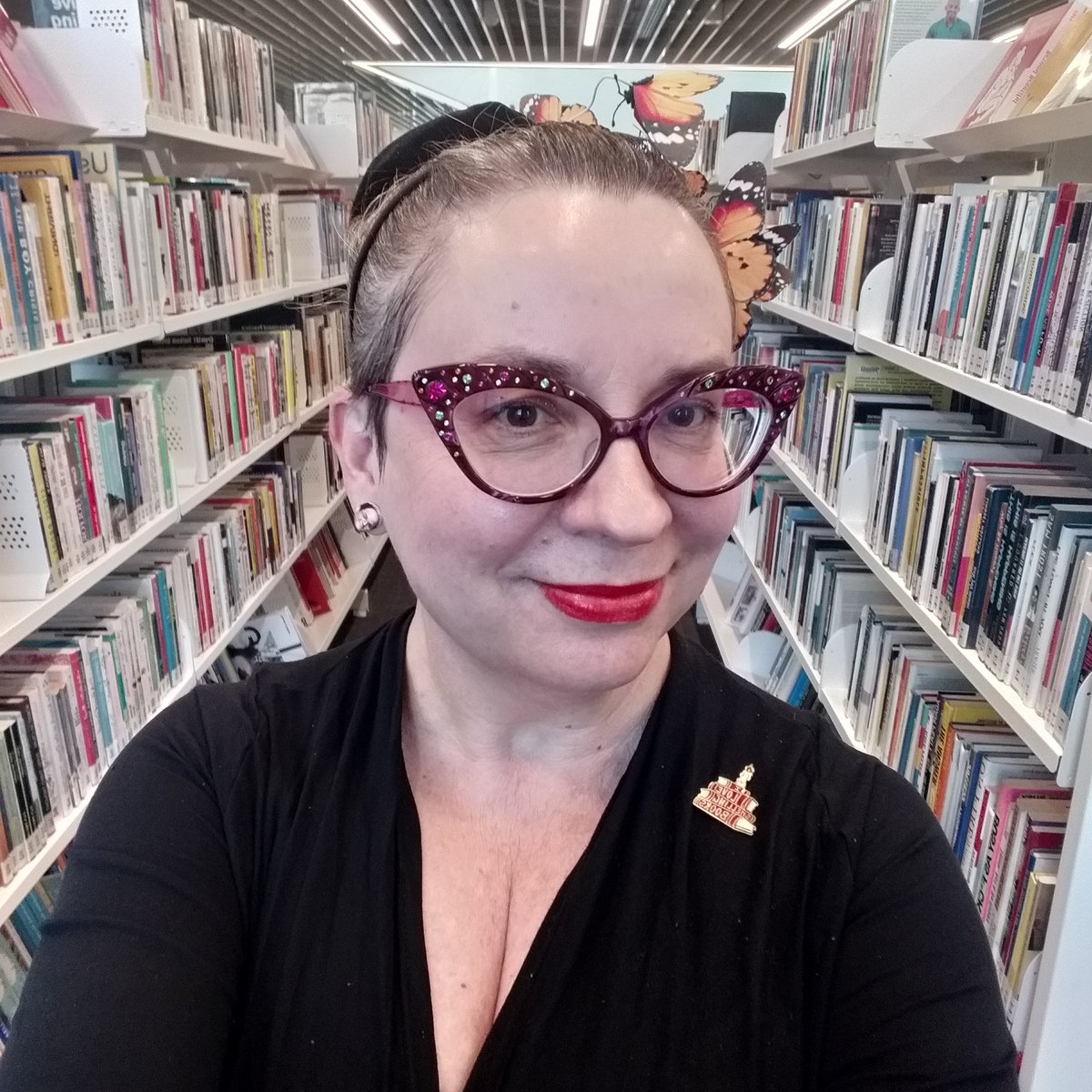 kebabette's tweet photo. Today's #WORDrobe for @wordchch. A George Costanza and Matt Berry earring cos they are MUSES. plus "I love smelling books pin". https://t.co/wQ293nf75X
