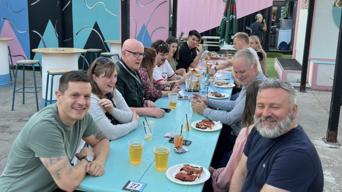 ThisDefinition's tweet photo. "Another month, another social! 🙌

To celebrate another great month at Definition, the #Leeds office went to Chow Down!  🥙

The team had so much fun spending time together whilst tasting various street food, listened to live music and had a few drinks.  " https://t.co/NDbu2NpqkY