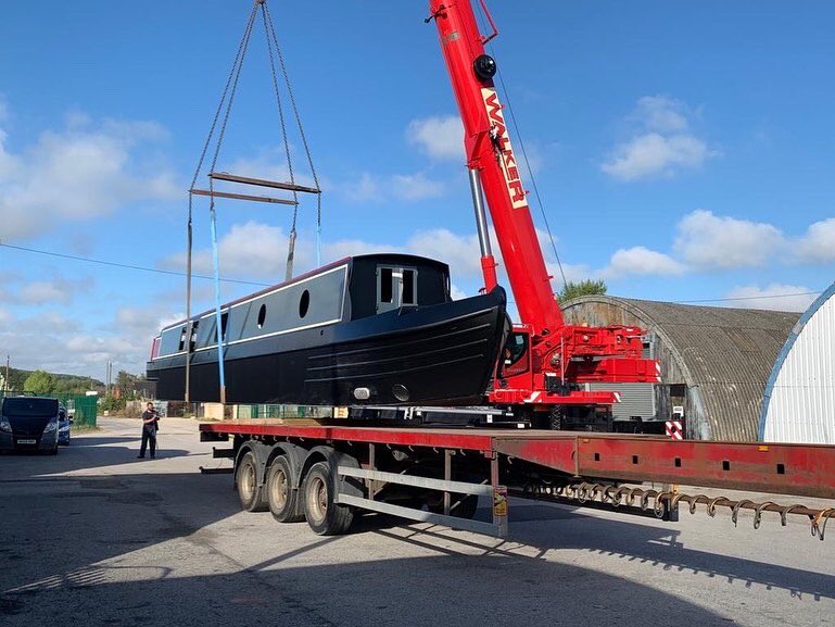 NBofDistinction's tweet photo. Boat No 19 being craned onto the lorry yesterday at XR&amp;D Boatbuilders against a backdrop of bright blue skies - exciting times for Kim and Jon #narrowboat #newnarrowboat https://t.co/0xK7MCKPDb