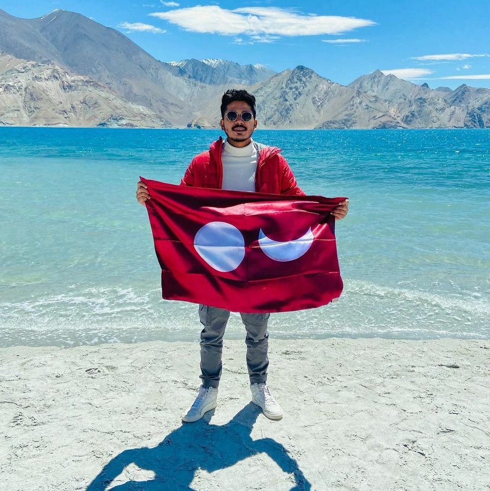 It's so overwhelming to see our youngsters who have taken up the task of protecting our identity. ©️Nikhil V Shetty with Tulunad flag at 14,000 ft Ladhak. Let's carry our identity with pride. #TuluOfficialinKA_KL #TuluTo8thSchedule @PMOIndia @narendramodi @CMofKarnataka