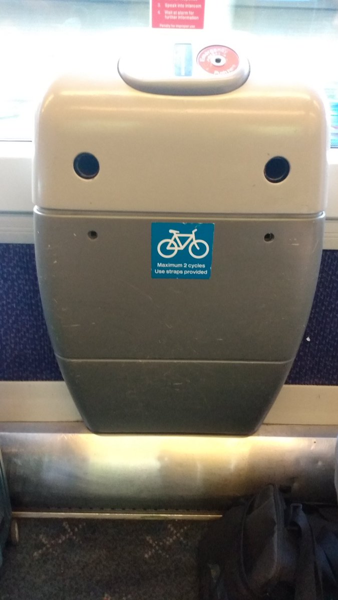 Solarune's tweet photo. The only bike space on the 0845 @EastMidRailway SHF-MAN this morning. It's also the only wheelchair space. If my bike didn't fold I'd have to block the gangway or a wheelchair spot. Not the first time. Should be space for more than 4 bikes &amp; 2 wheelchairs on this busy service! https://t.co/cM2tG4o1Zf