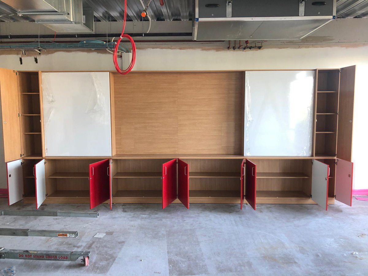 apmgltd's tweet image. This #TeachingWall at @ossmastoke will house a 72&quot; screen, the sliding doors are whiteboards, &amp;amp; the cupboards are all lockable. Everything neatly put away but conveniently to hand for the teacher; no distracting clutter for the students. #Furniture envy? bit.ly/CallAPMG