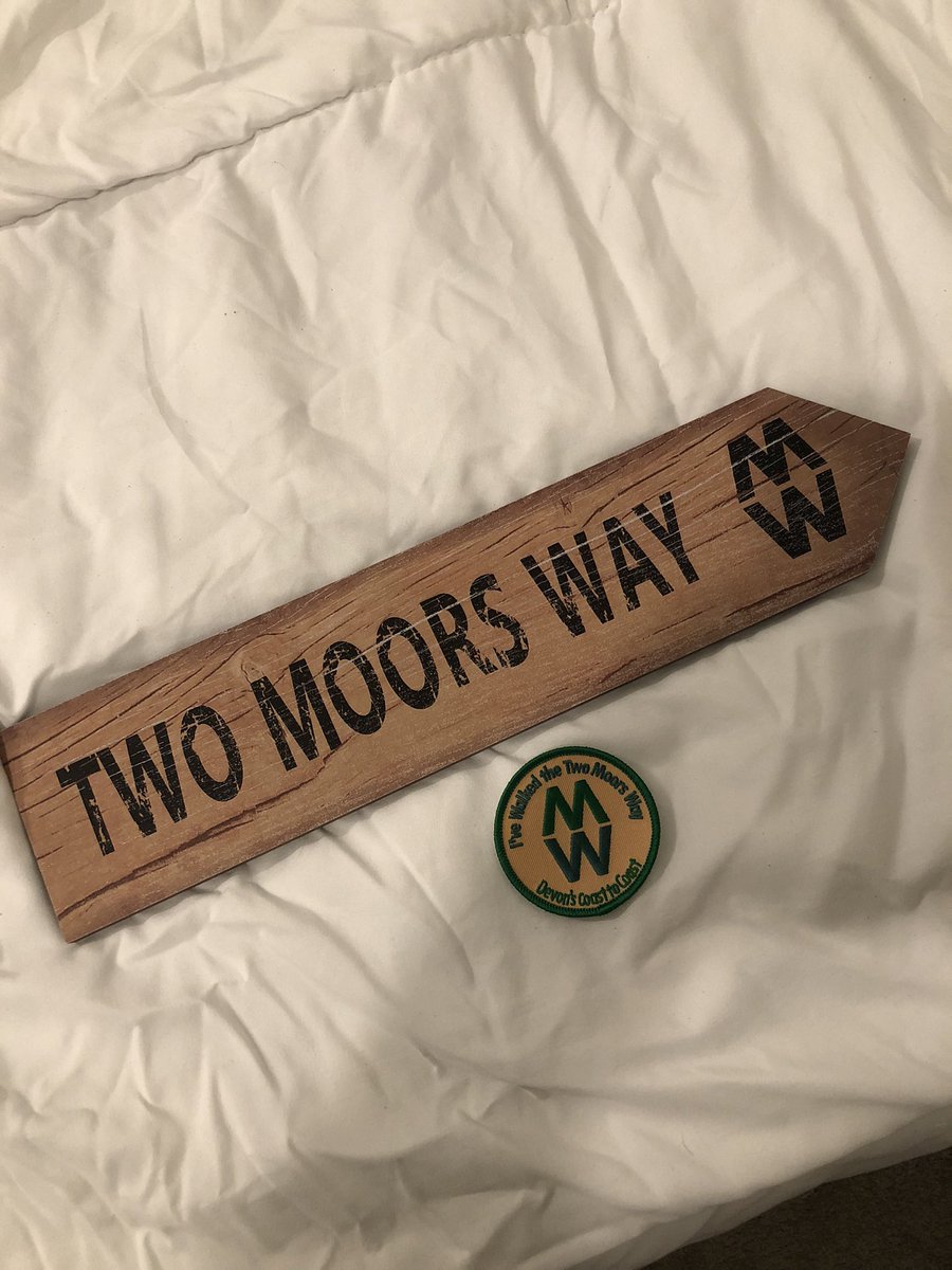 Dodge__Games's tweet photo. Went back to Lynmouth,the end of the #twomoorsway as the t-shirt my wife got from @macmillancancer arrived after I finished :) Had to get a finish line photo with it & picked up some merch from the @ExmoorNP centre which was closed when I got there.Also signed the trail book :) https://t.co/0SXhZGNcwb