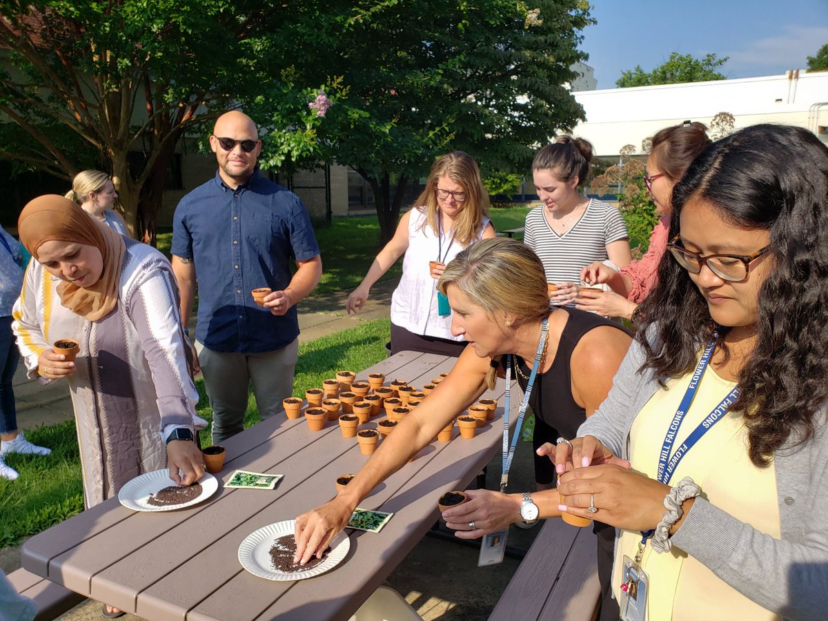 Cre8tiveLib's tweet photo. Thank you @GreenKidsANS &amp; @ANSgina for leading an @es_flower preservice PD with all staff outside in our beautiful courtyard.  We learned about the @MAEOE_MD Green School program, reflected on ways in which we enjoy nature, and planted seeds of hope for the new school year. https://t.co/oKu79Hu2Gn