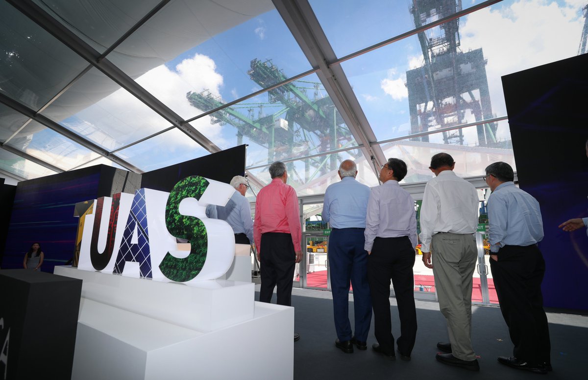 leehsienloong's tweet photo. Very happy to officially launch Tuas Port today! Our decision to press on with it despite the pandemic, sends a strong signal to the world that Singapore is open for business &amp; going full steam ahead. It's a project every Singaporean can be proud of. – LHL https://t.co/TtcE243mTo https://t.co/aU2KJs9KkR