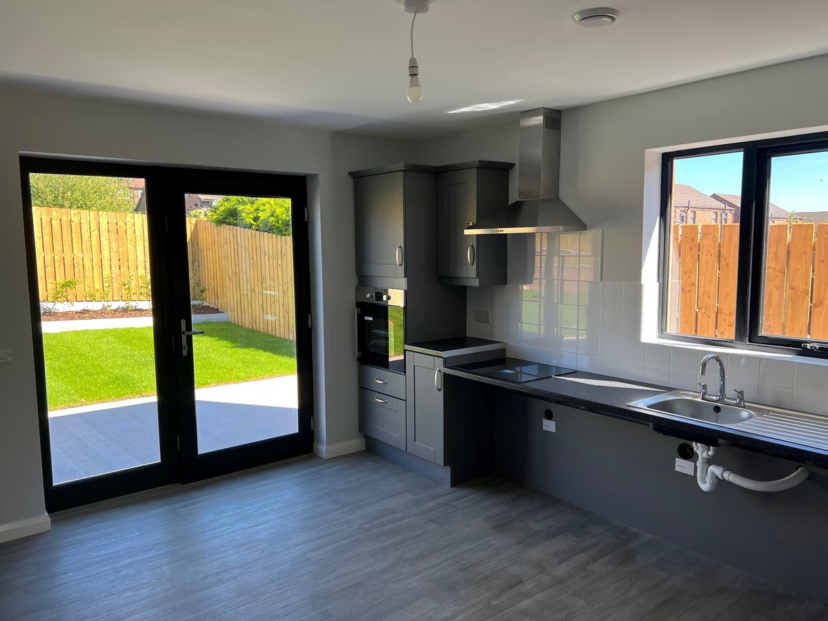 mjmcbrideltd's tweet photo. We recently handed over the Glenbryn Park scheme to @ClanmilHousing. 12 houses were built on a sloped site in North Belfast and included the construction of a Complex Needs bungalow. Thanks to the design team, led by Doherty Architects, for their help in completing this project. https://t.co/E1bLoqk4D8
