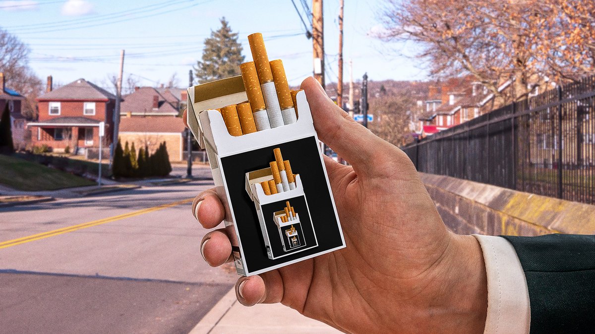 TheOnion's tweet photo. FDA Requires Cigarette Packs Have Image Of Cigarette Pack Which Itself Has Smaller Image Of Cigarette Pack To Make Smokers Question Where This All Ends https://t.co/DCk5ivyVBf https://t.co/noppQRWhfb