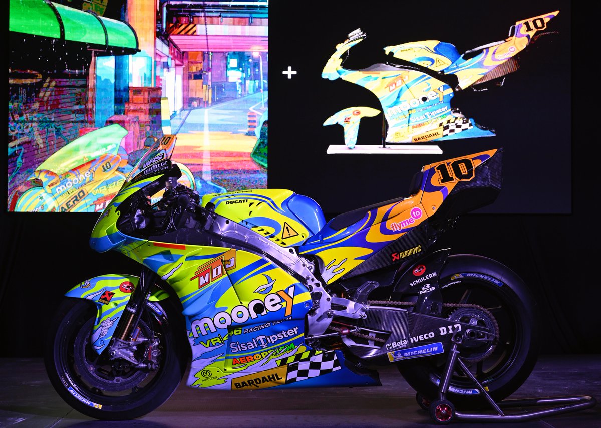 VR46RacingTeam's tweet photo. 🌈 AEROPRISM ⚠️

We’re happy to show you our special livery and project for the next Sunday, inspired by the artistic works of @Mad_Dog_Jones 💥 @vr46metaverse @MooneyGroup @VRRidersAcademy 

#VR46Metaverse #MooneyVR46RacingTeam #MotoGP #SanMarinoGP #VR46 https://t.co/n7dQkZB5ky