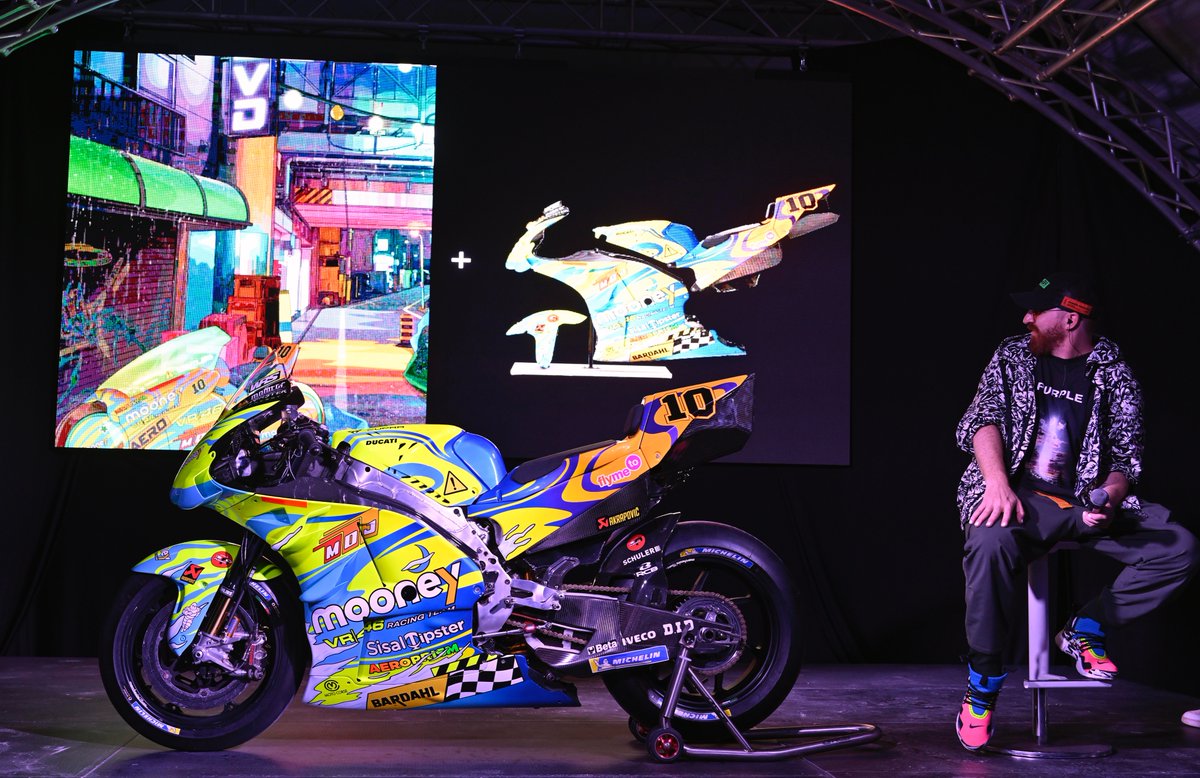 VR46RacingTeam's tweet photo. 🌈 AEROPRISM ⚠️

We’re happy to show you our special livery and project for the next Sunday, inspired by the artistic works of @Mad_Dog_Jones 💥 @vr46metaverse @MooneyGroup @VRRidersAcademy 

#VR46Metaverse #MooneyVR46RacingTeam #MotoGP #SanMarinoGP #VR46 https://t.co/n7dQkZB5ky